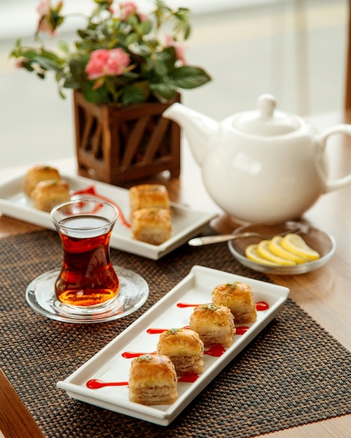 Turkish pakhlava with pistachio and black tea