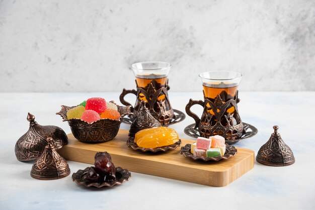 Turkish tea set. Colorful marmalade and fragrant tea