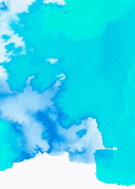 ターコイズブルーの水彩画の手描きのストロークの背景