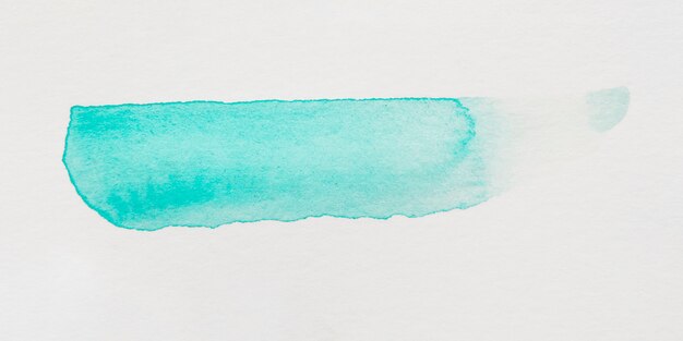 Turquoise brush stroke on white background