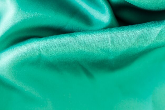 Turquoise fabric material texture with copy space