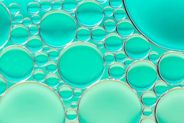 Turquoise green abstract background with bubbles