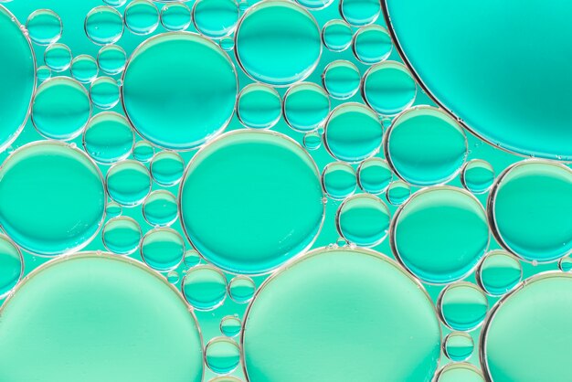 Turquoise green abstract background with bubbles