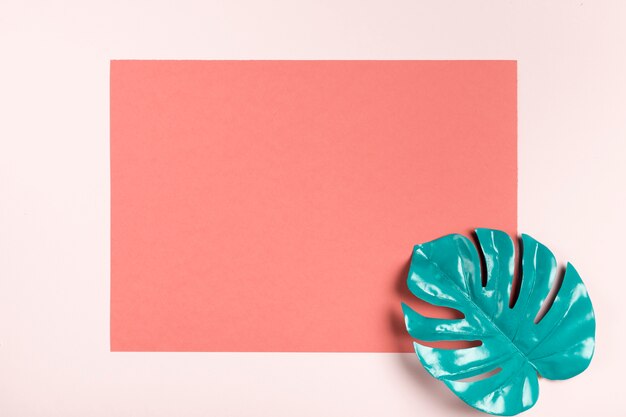 Turquoise leaf on pink rectangle mock-up