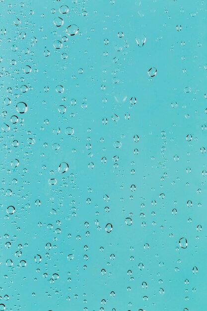 Turquoise surface with water drops