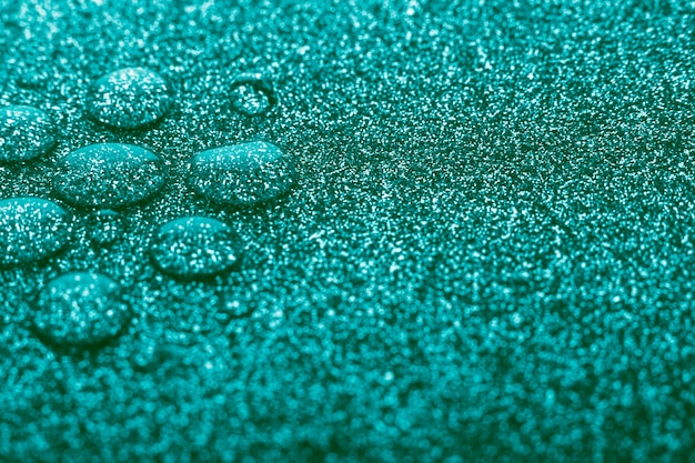 Бесплатное фото Бирюзовый фон с каплями воды