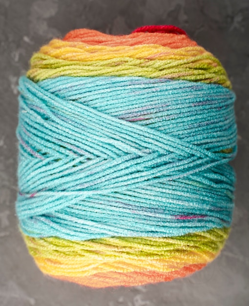 Turquoise, yellow and orange colored wool