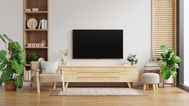 Tv cabinet on the white wall in living room with armchair,minimal design,3d rendering