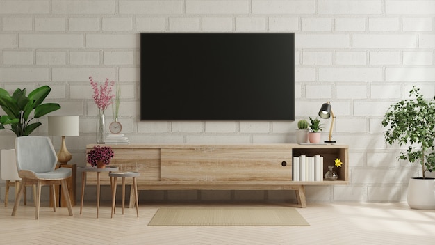 A tv in modern living room with armchair and plant on brick wall.3d rendering