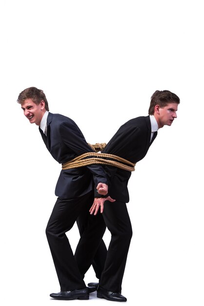 Premium Photo Twin Brothers Tied Up With Rope Isolated On The White