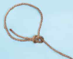 Бесплатное фото Шпагат прочный бежевый верёвка простой узел