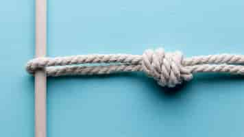 Free photo twine strong white rope holding a bar