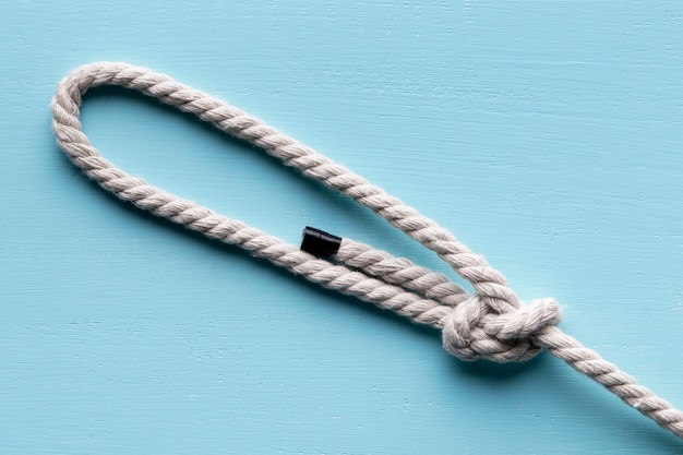 Free photo twine strong white rope with knot