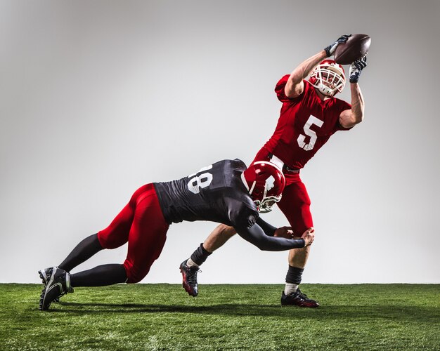 two american football players in action