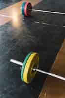 Free photo two barbells on floor