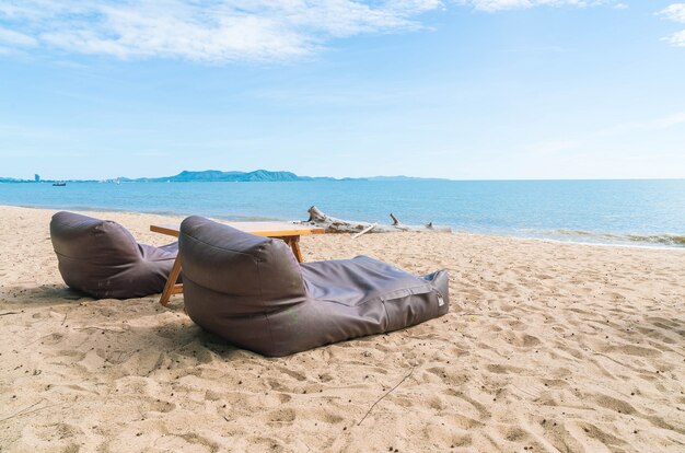 Two bean bags and outdoor table