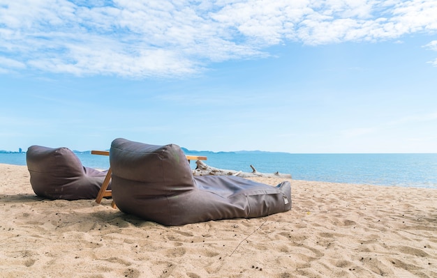 Two bean bags and outdoor table