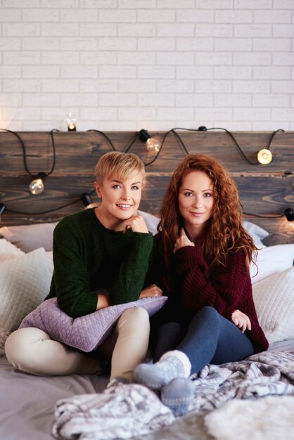 Two beautiful girls in bedroom