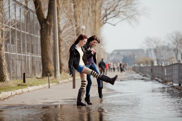 Two beautiful teenage students walking together