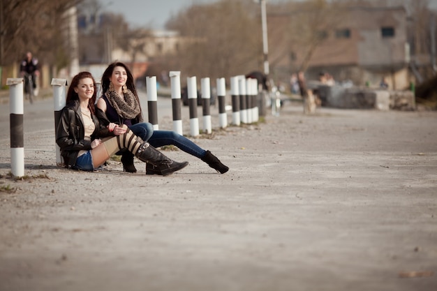 Two beautiful teenage students walking together