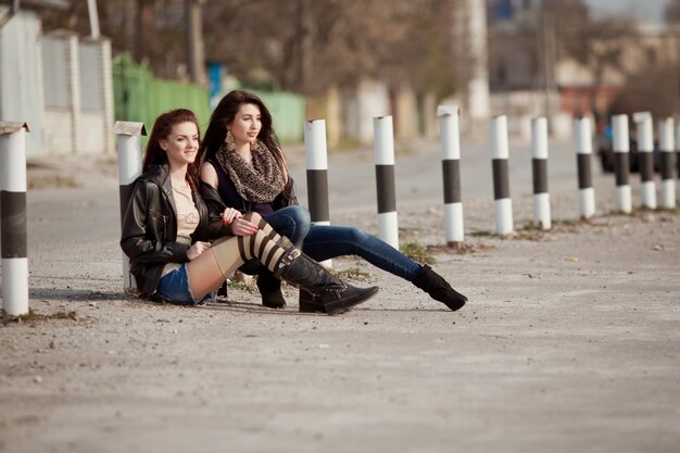 Two beautiful teenage students walking together