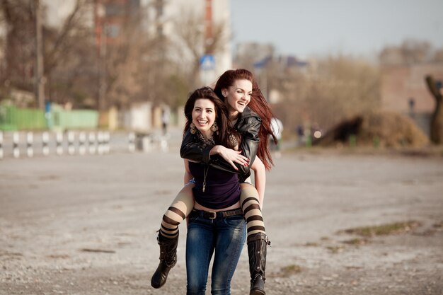 Two beautiful teenage students walking together