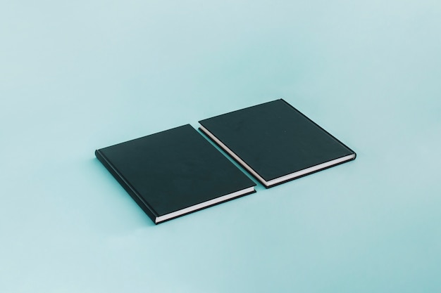 Free photo two black notebooks