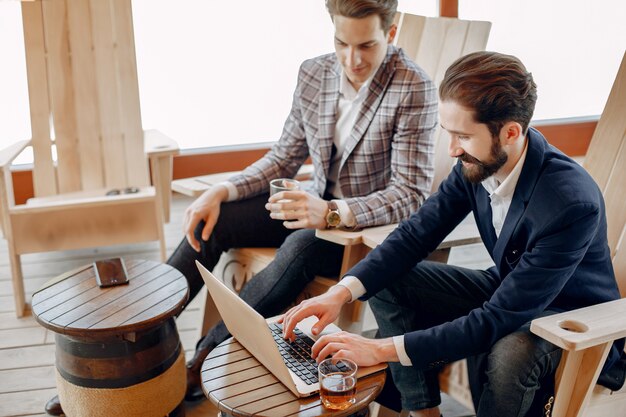 Two businessmen working at the office