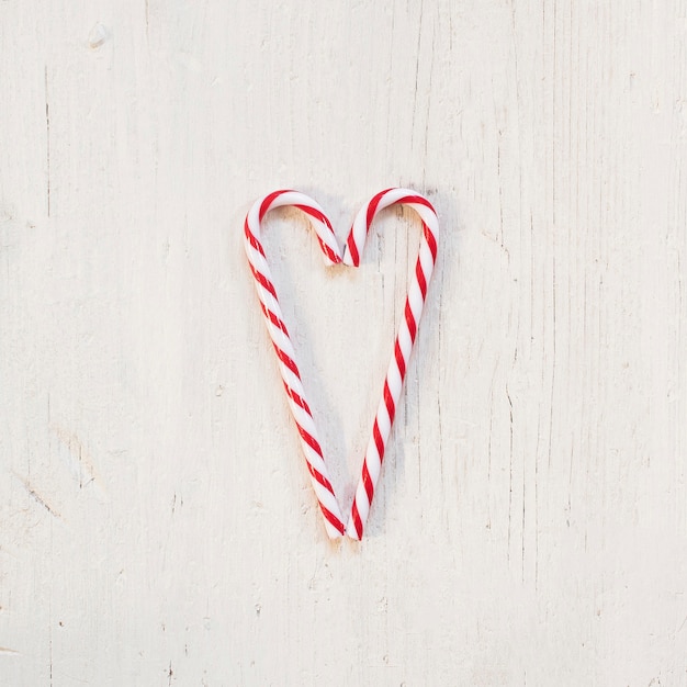 Two candy canes making a heart for Christmas