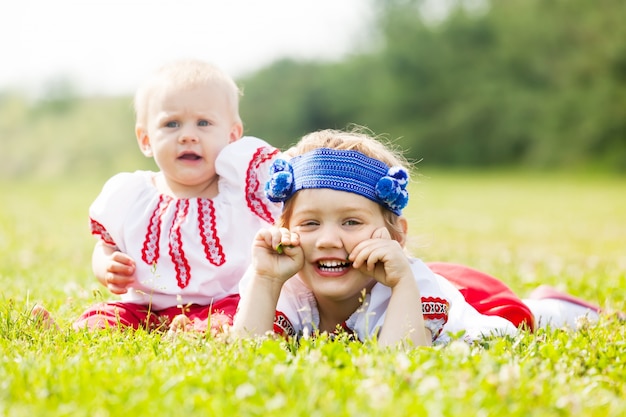 Free photo two children in traditional folk clothes