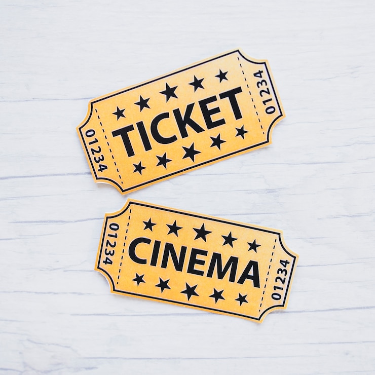 Free Photo two cinema tickets on table