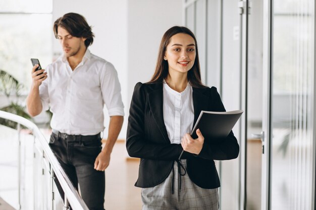 Two collegues working in a business center