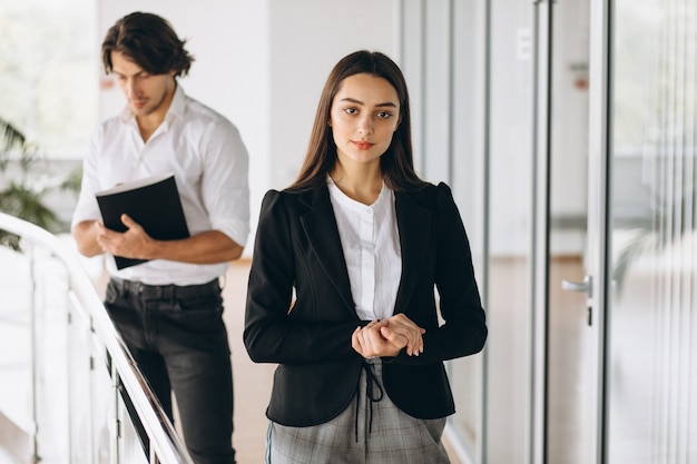 Two collegues working in a business center