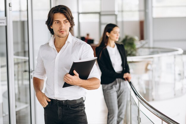 Two collegues working in a business center