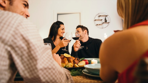 Free photo two couples at christmas dinner