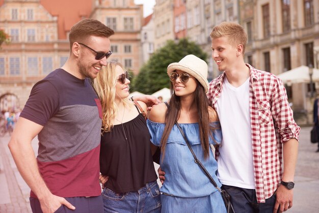 Two couples visiting the city