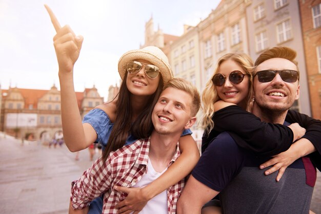 Two couples visiting the city
