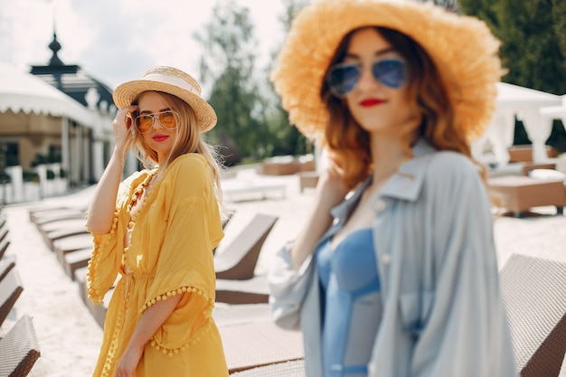 Two elegant girls on a resort