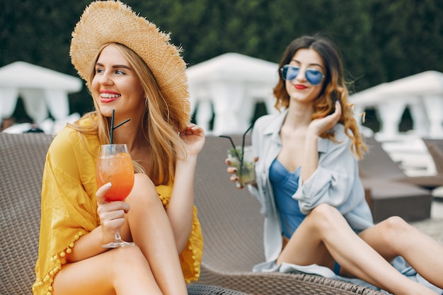 Two elegant girls on a resort