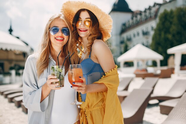 Two elegant girls on a resort