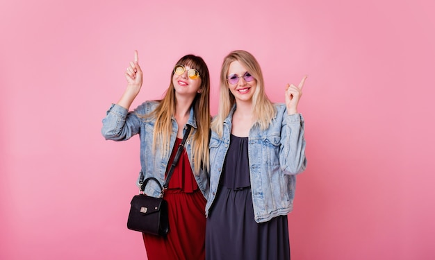 Two excited friends having great time together