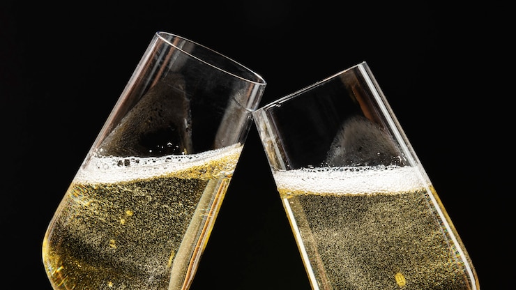 Free Photo two festive champagne glasses celebration
