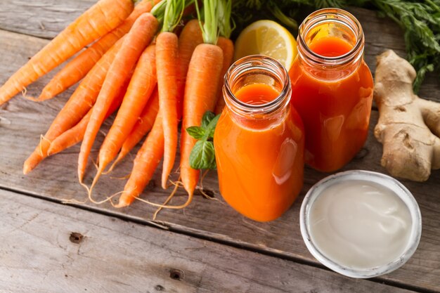 Two fresh carrot smoothies