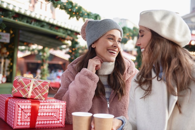 Two friends spending time on Christmas Market