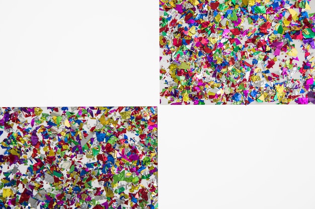 Two geometric shape made with colorful confetti on white backdrop