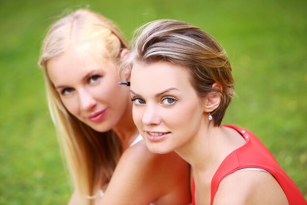 Two girls are having fun in the park