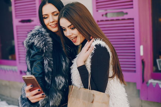 Two girls in a city