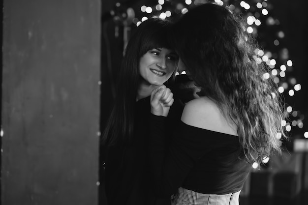 Two girls in each other's tender embraces