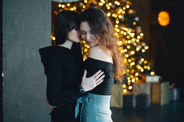 Two girls in each other's tender embraces