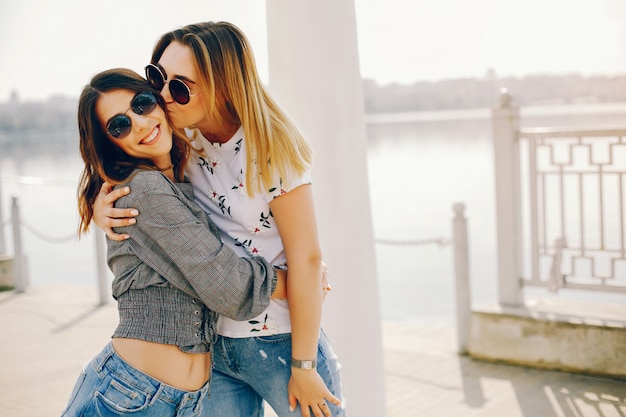 Free photo two girls in a summer park